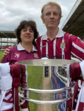 Mark and Mel with playoff trophy I 2020 - Cropped